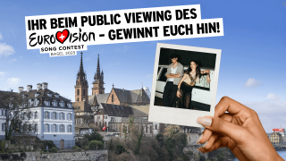 Plakat für die ESC-Verlosung mit Basel im Hintergrund und ein Bild von Abor & Tynna im Vordergrund. (Quelle: )